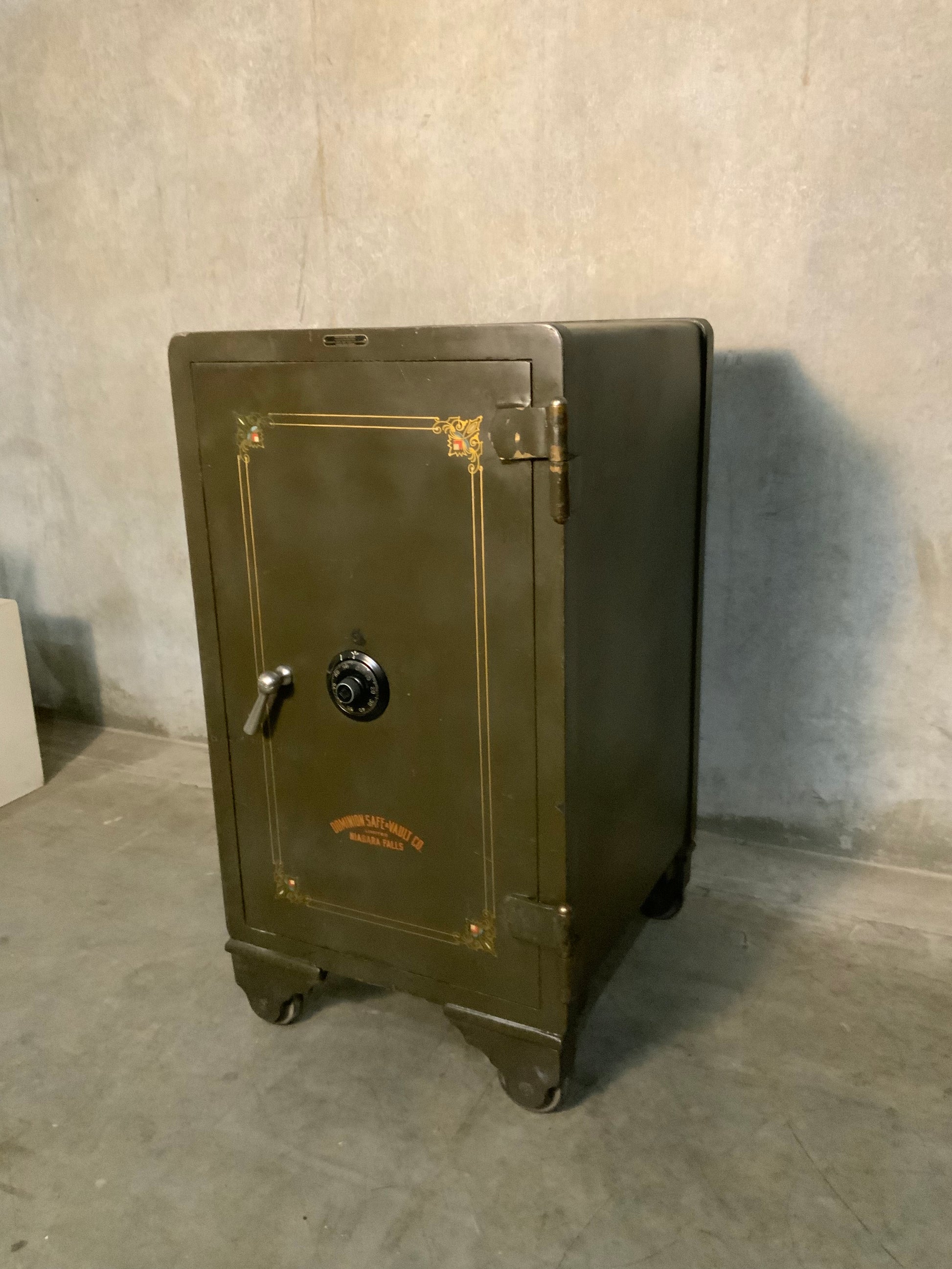 1920 Dominion floor rolling Industrial safe Vault | Scott Landon Antiques and Interiors.