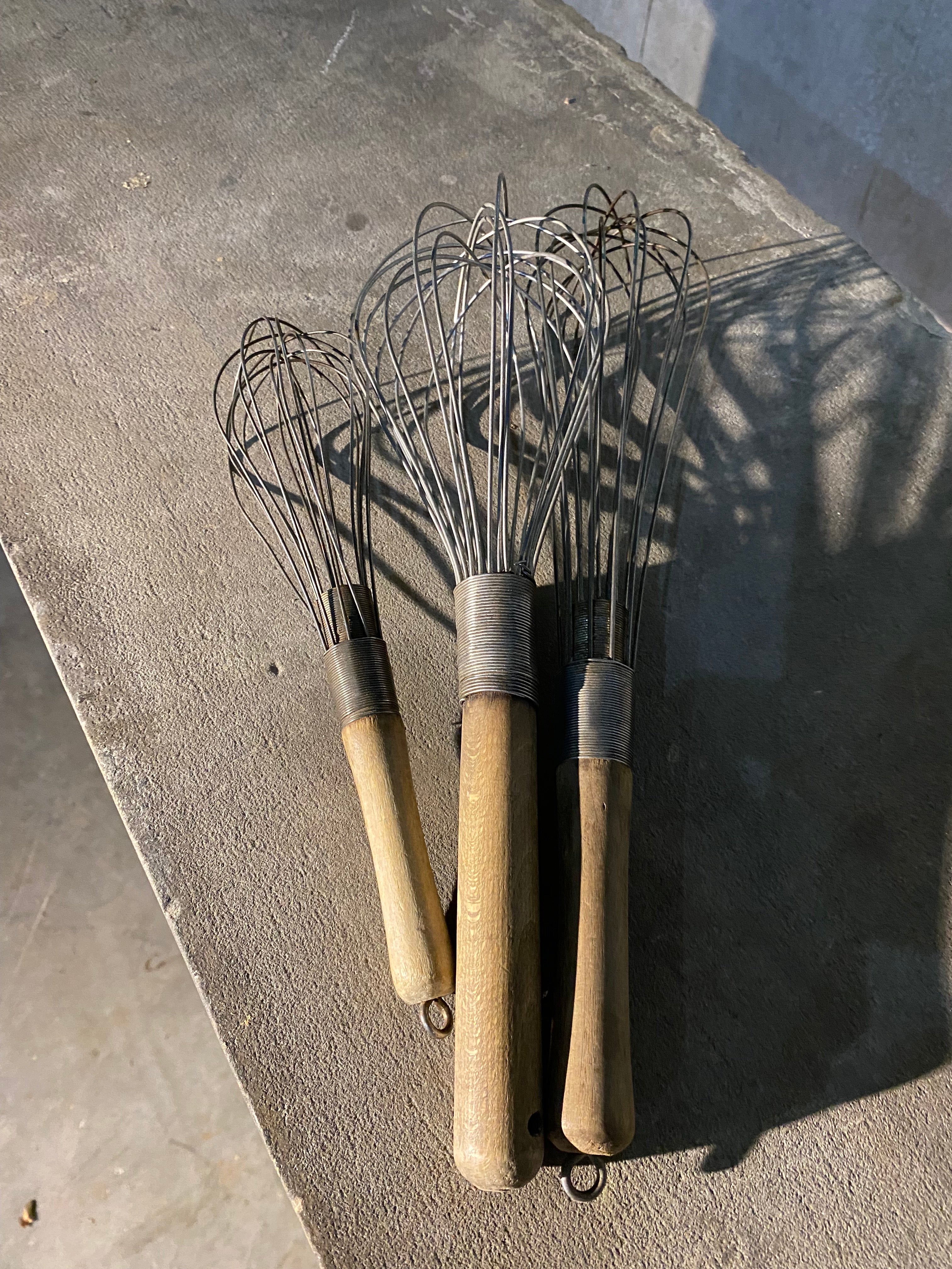 Set of three mid 20th c  Iron Wood  kitchen Whisk | Scott Landon Antiques and Interiors.