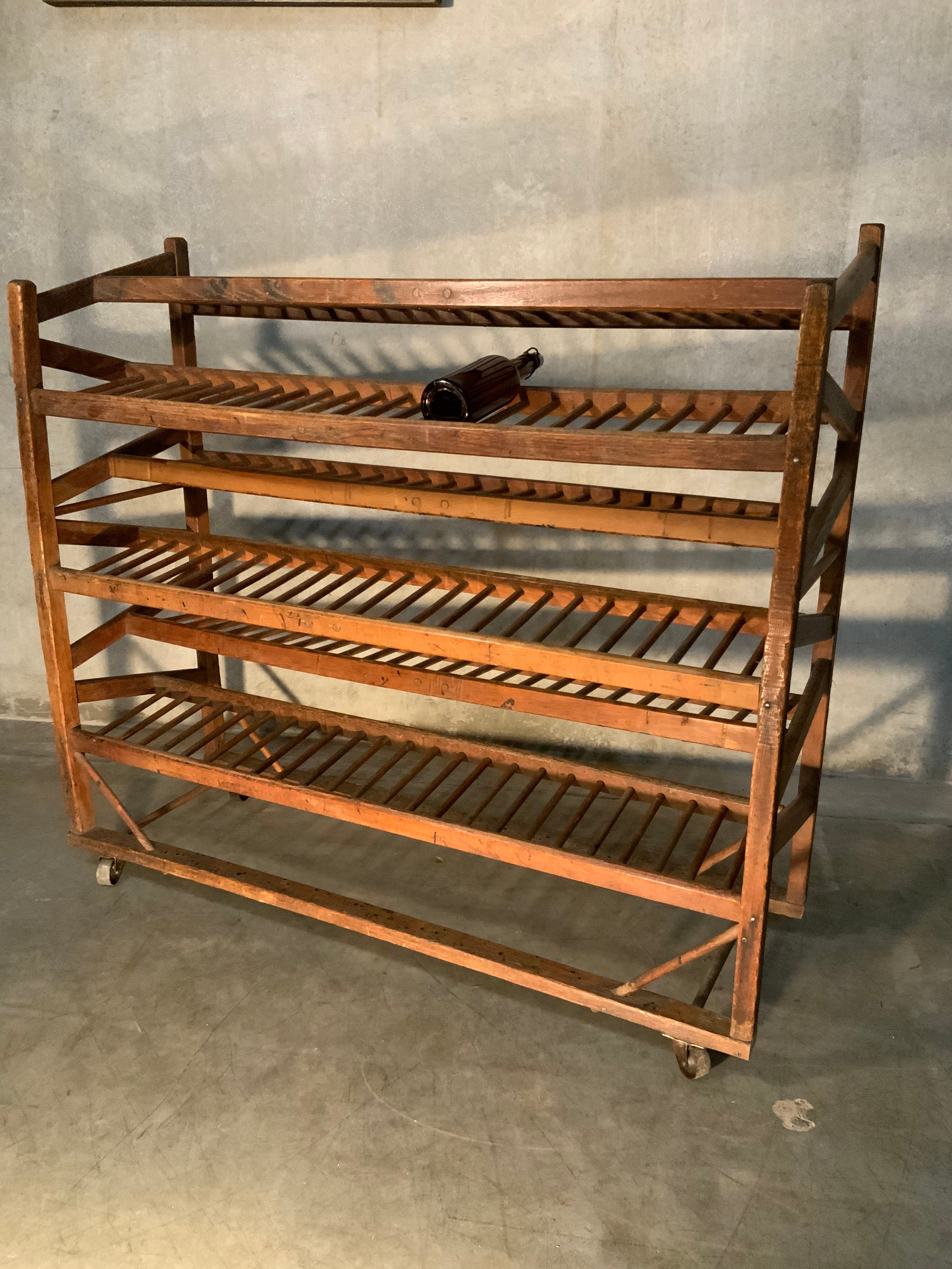 1920 VERY  UNIQUE industrial rolling  shoe rack | Scott Landon Antiques and Interiors.