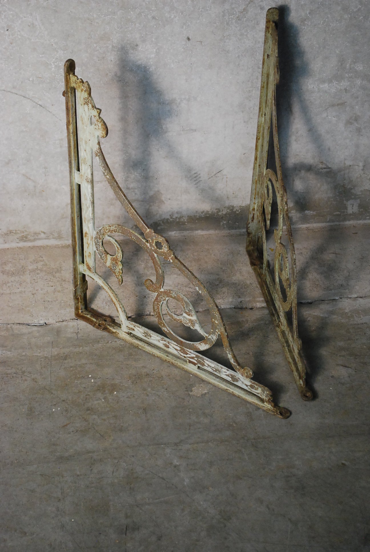 1920 iron decorative Brackets | Scott Landon Antiques and Interiors.