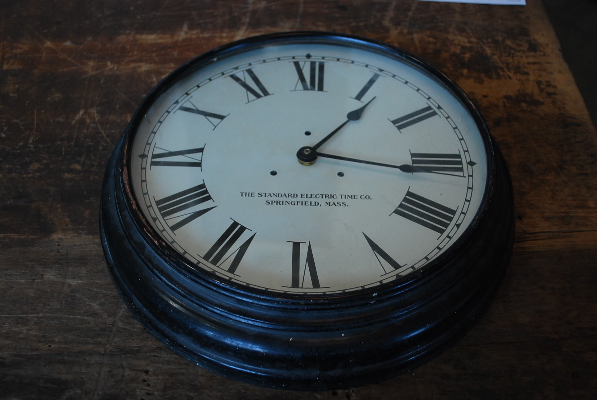 1930 copper industrial wall Clock | Scott Landon Antiques and Interiors.