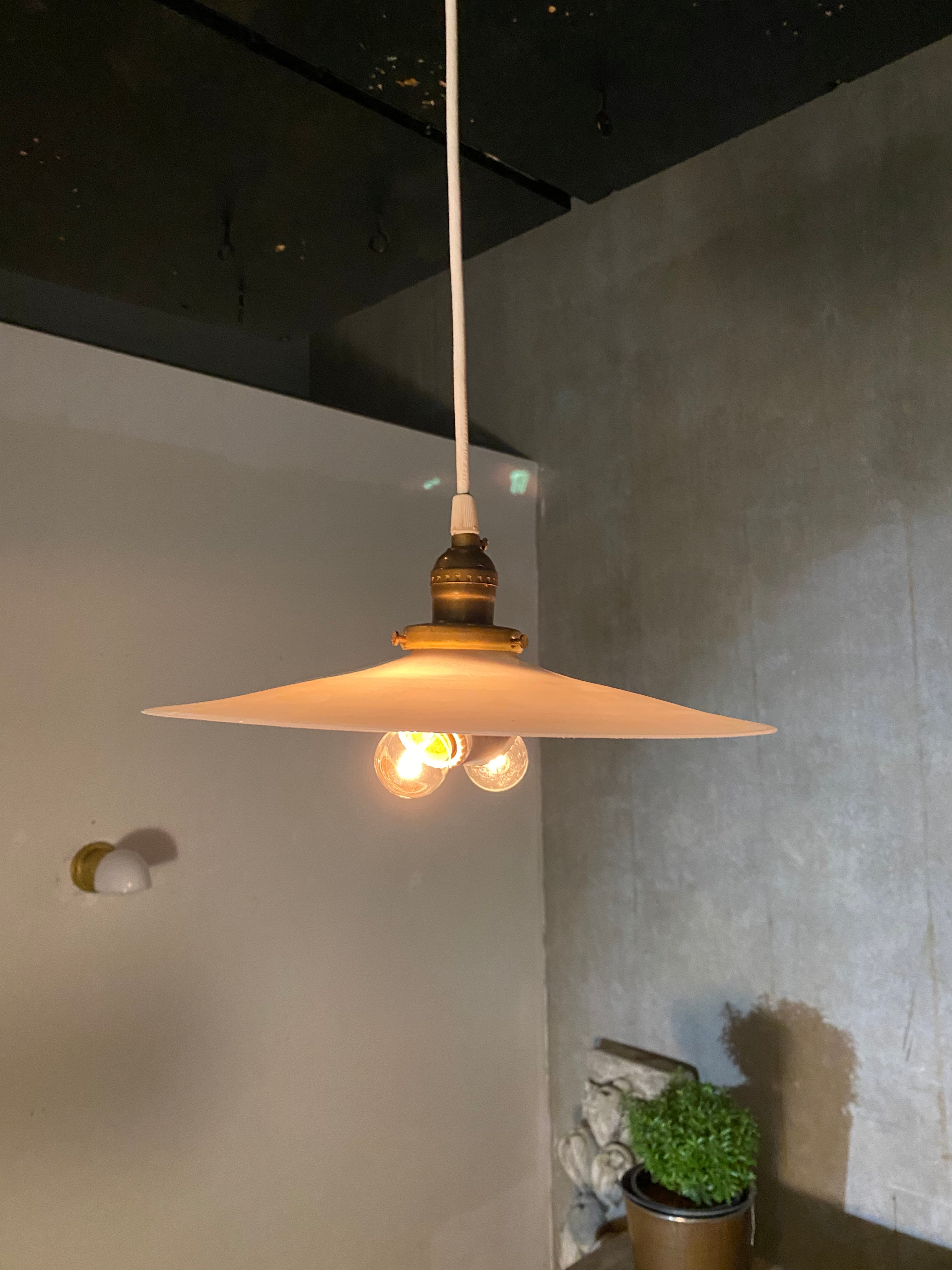 1910  Brass petite milk glass saucer pendant | Scott Landon Antiques and Interiors.