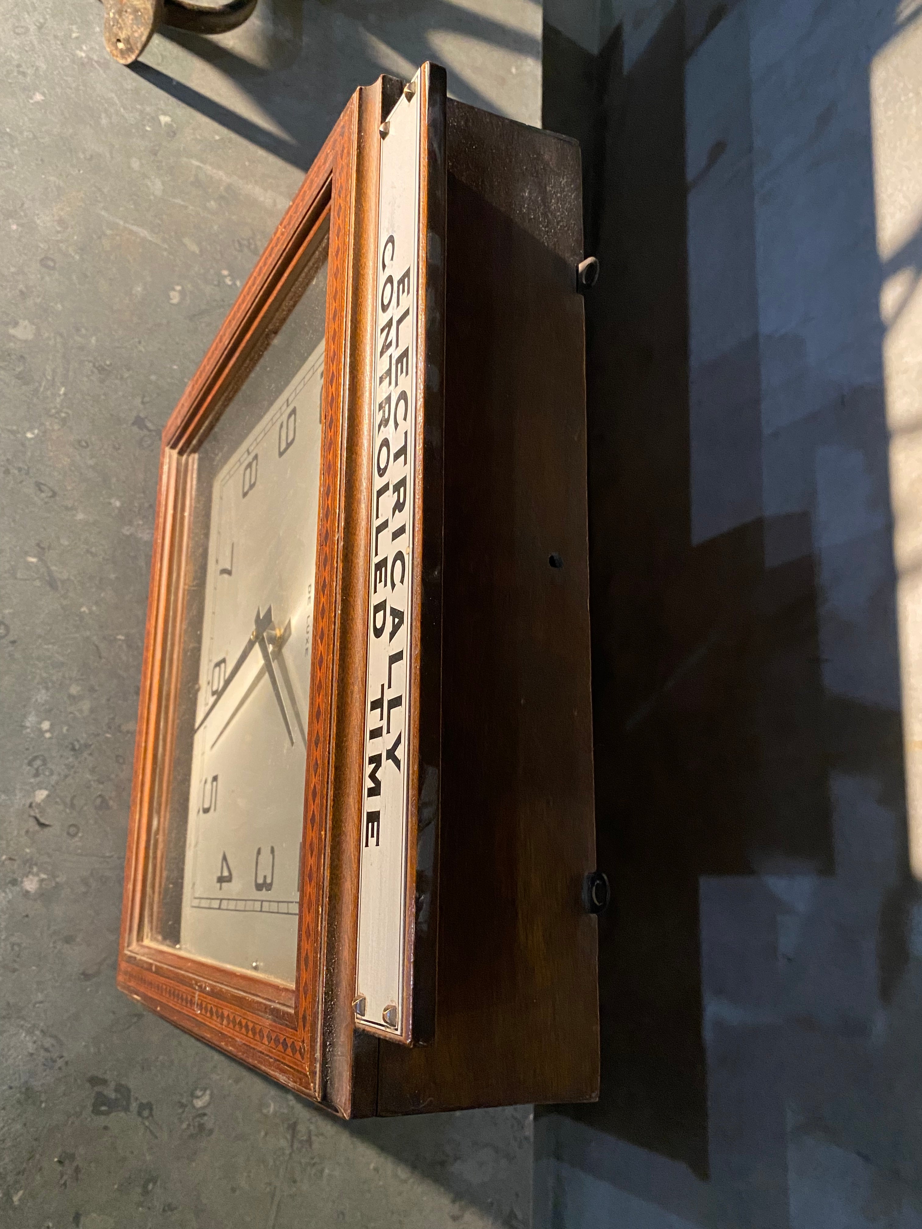 1930  ART DECO  Bulova wall clock store advertising | Scott Landon Antiques and Interiors.