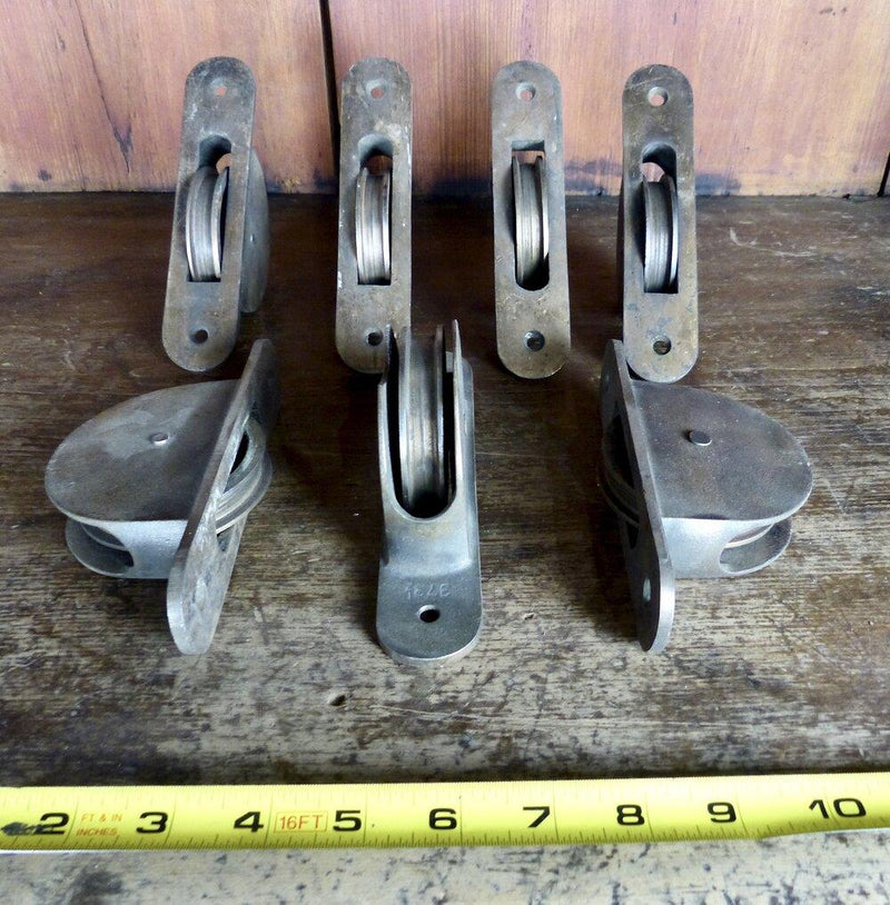 1920 brass insert Pulleys | Scott Landon Antiques and Interiors.