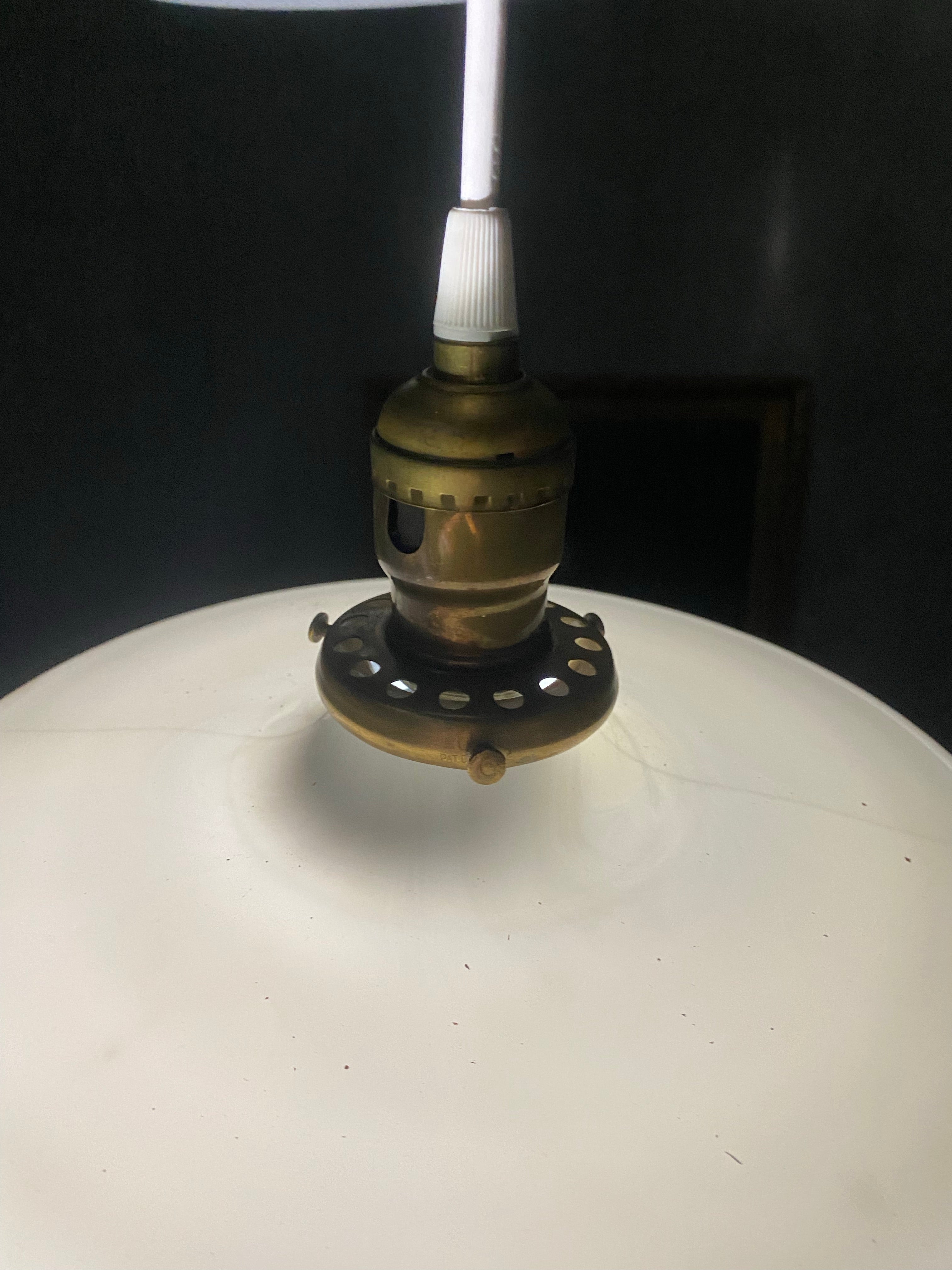 1920 pair of milk glass disc pendant lights | Scott Landon Antiques and Interiors.